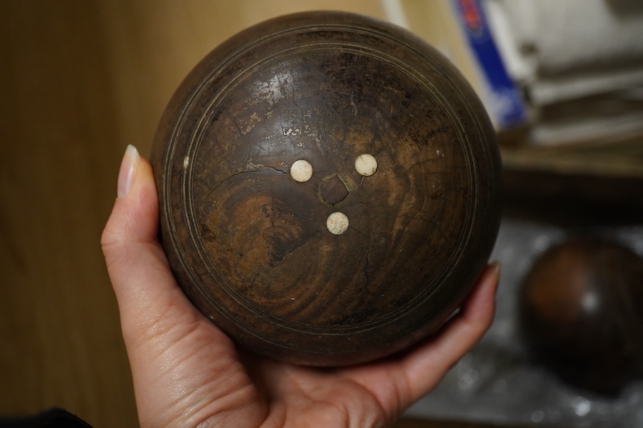 A set of four lignum vitae bowls